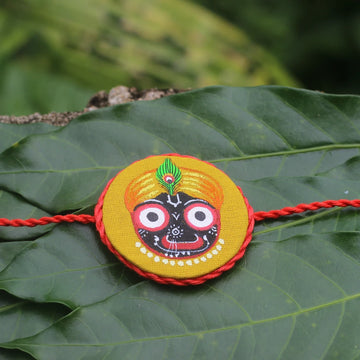 Hand-painted Pattachitra Handpaintedjaganathyellowrakhi Festive Decor by Maavni