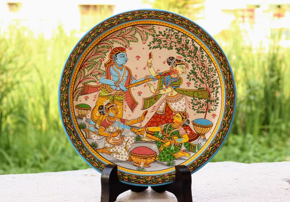 Hand-painted Pattachitra Krishna Radha Holi Theme Wall Plate by Maavni