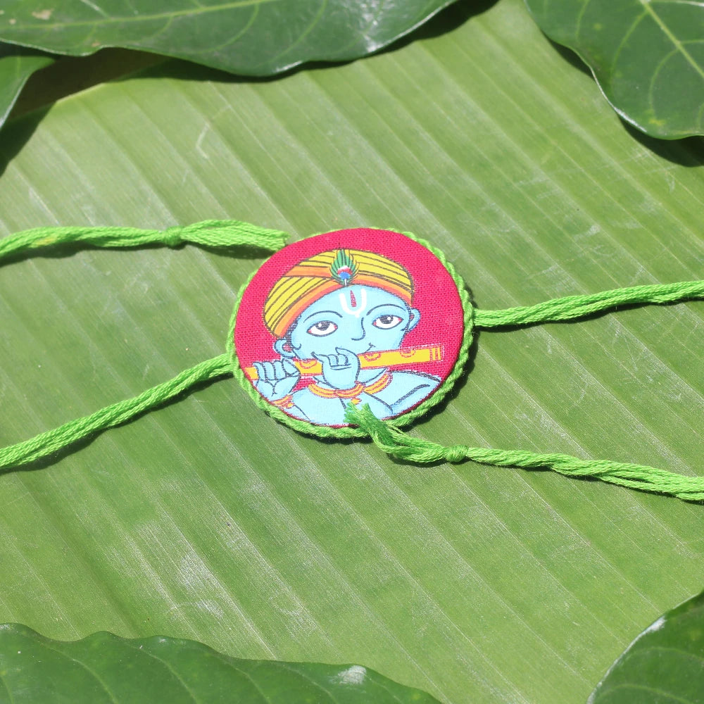 Hand-painted Pattachitra Krishna Rakhi Festive Decor gallery image by Maavni