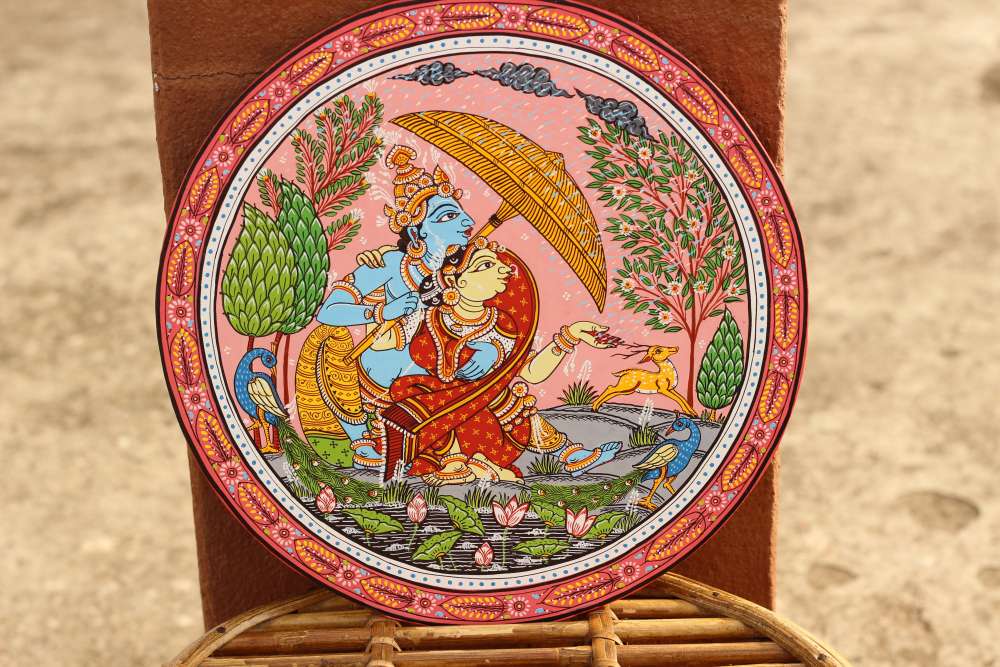 Hand-painted Pattachitra Radha Krihsna Love In Rainy Season Wall Plate by Maavni