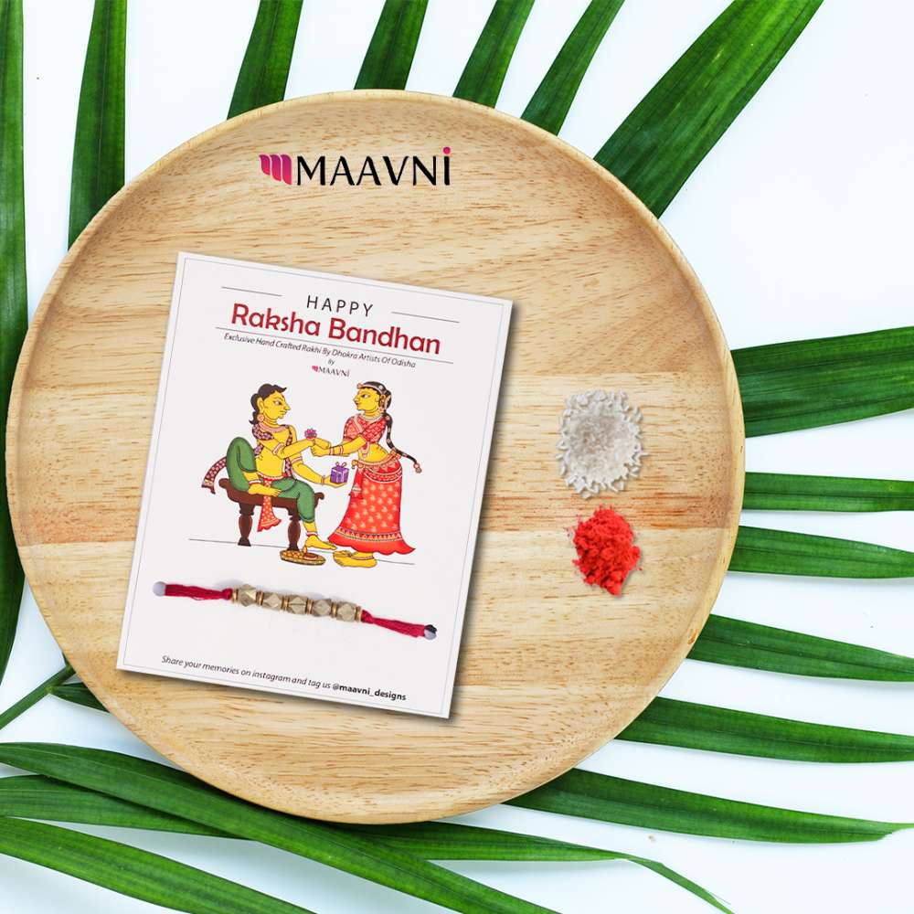 Hand-painted Pattachitra Dhokra Rakhi Festive Decor gallery image by Maavni