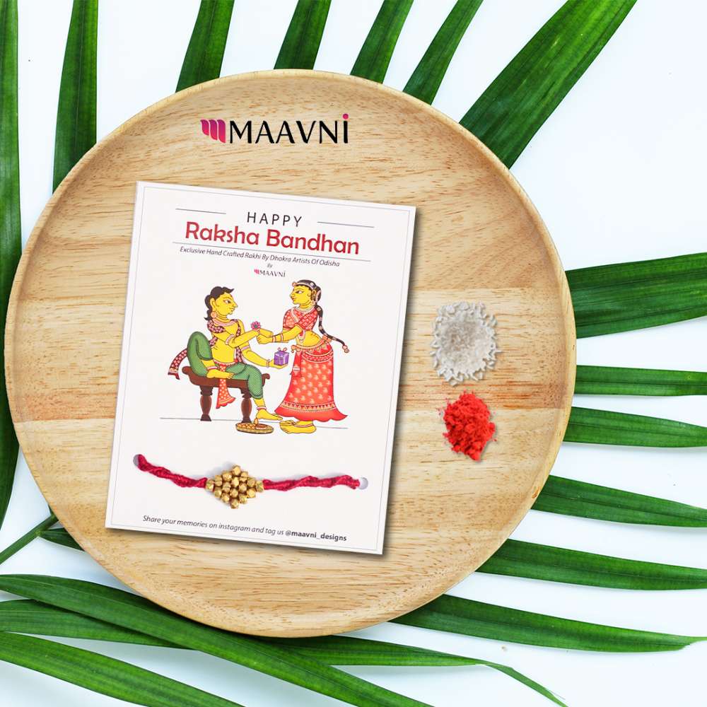 Hand-painted Pattachitra Dhokra Rakhi Festive Decor gallery image by Maavni