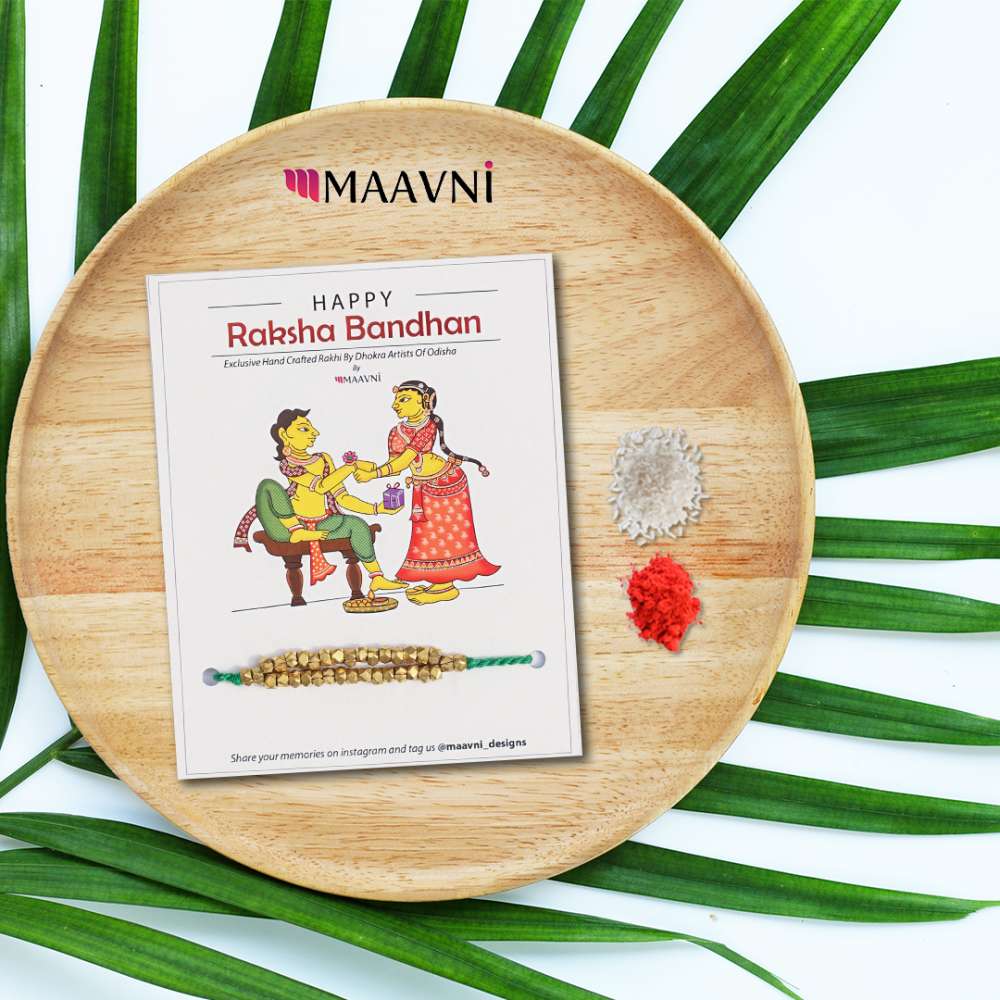 Hand-painted Pattachitra Dhokra Rakhi Festive Decor gallery image by Maavni