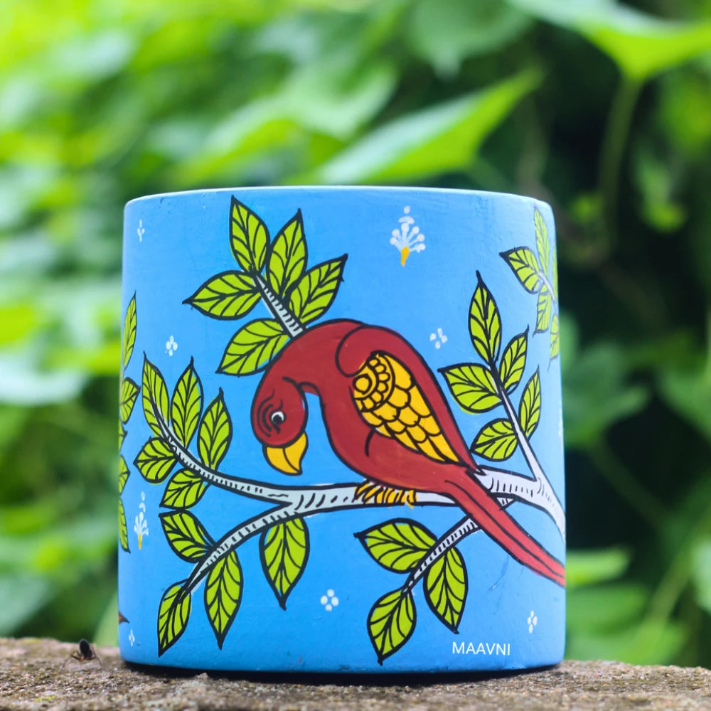 Hand-painted Pattachitra Parrot Sitting On Branch Pen Stand by Maavni