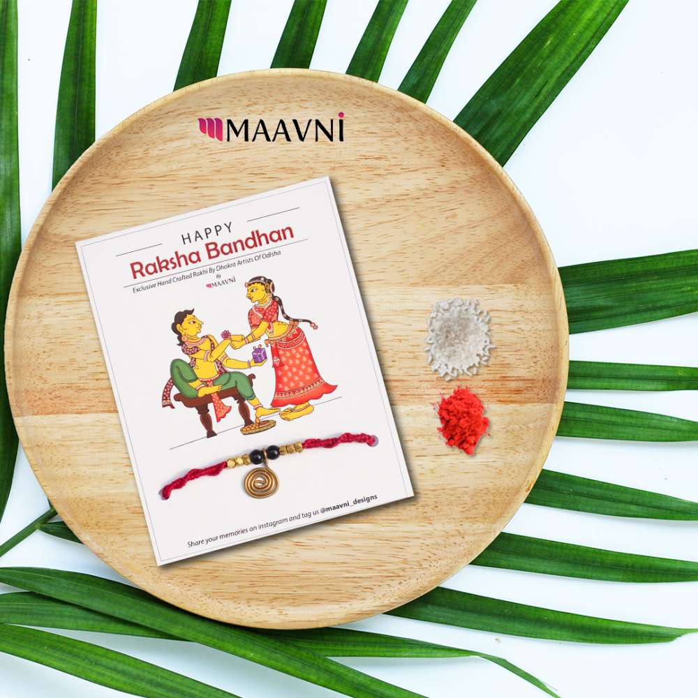 Hand-painted Pattachitra Dhokra Rakhi Festive Decor gallery image by Maavni