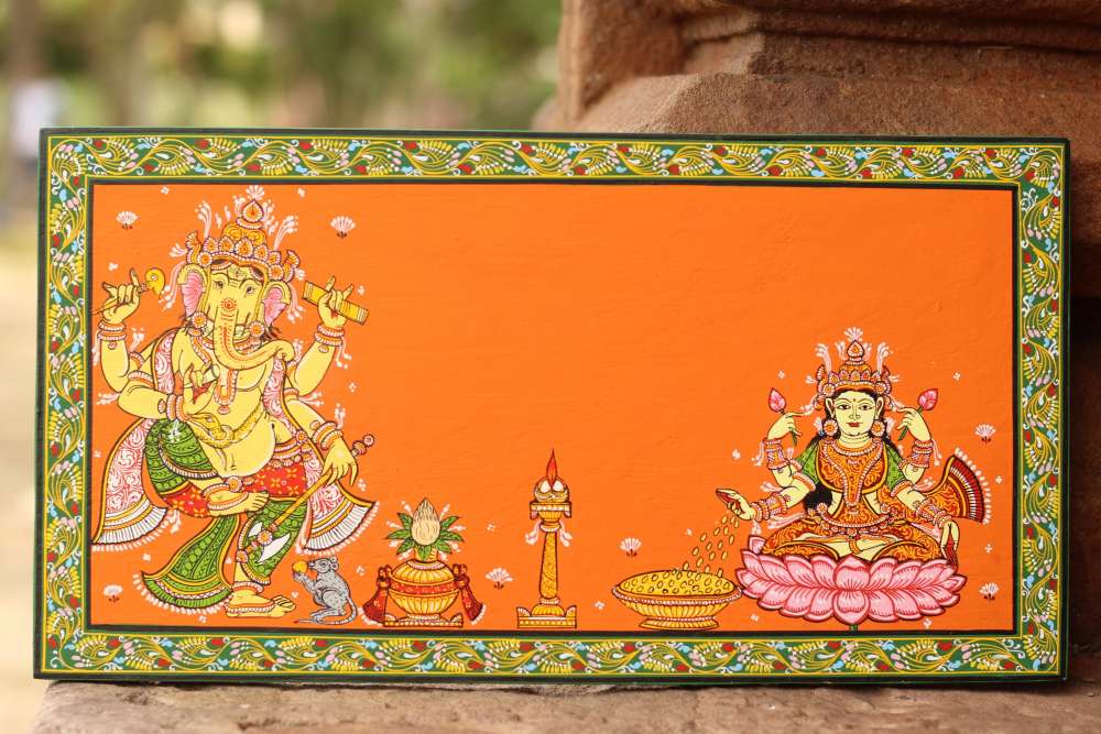 Hand-painted Pattachitra Ganesha And Laxmi Border Wall Plate by Maavni
